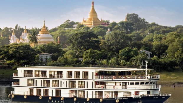 Sanctuary Ananda sails on the Irrawaddy River past Sagaing. 