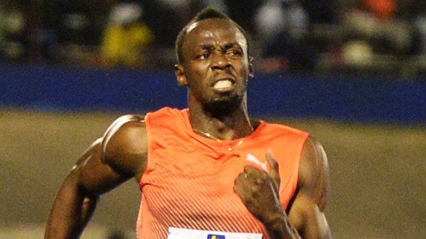 Usain Bolt wins the 100-metre event in Kingston.