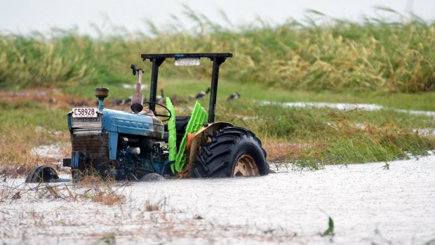 A tractor on an inundated property south of Bowen, Queensland.