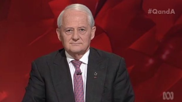 Senior Coalition MP Philip Ruddock wore his Amnesty International badge with pride and was confronted by US academic Cornel West over Australia's immigration policy.