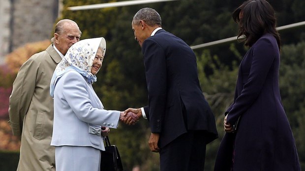 US President Barack Obama and his wife, First Lady Michelle Obama, are greeted by Queen Elizabeth II and Prince Phillip at Windsor Castle.