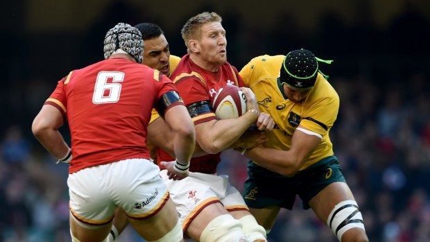 Breakthrough: Adam Coleman aims up in defence against Wales last year.