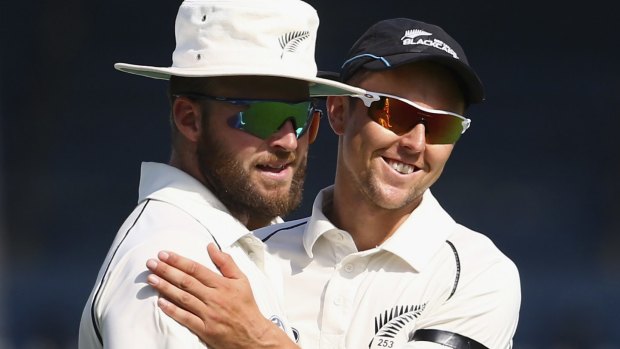 Sweet bro: Trent Boult congratulates Mark Craig after taking seven wickets against Pakistan.
