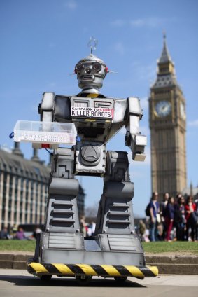 A robot distributes promotional literature calling for a ban on fully autonomous weapons in London's Parliament Square last year.