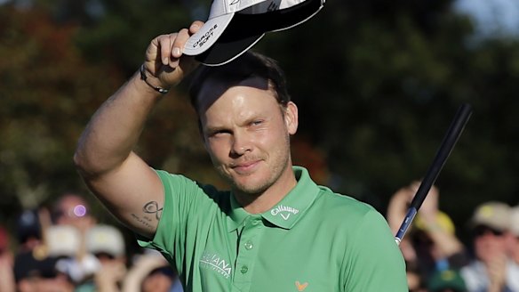 Danny Willett waves to the gallery after finishing his final round.