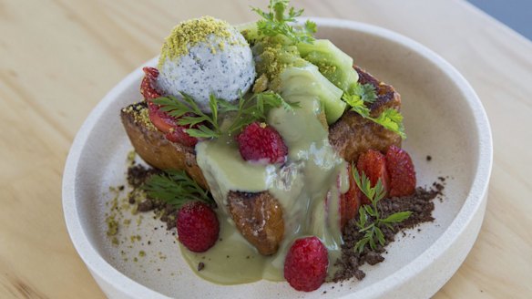 Shibuya-style honey toast with matcha custard, black sesame ice-cream, fruit and flowers.