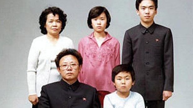 North Korean leader Kim Jong-il, seated, in 1981. First-born son Kim Jong-nam is bottom right.