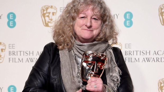 Eye of the storm: Costume designer Jenny Beavan with her BAFTA.