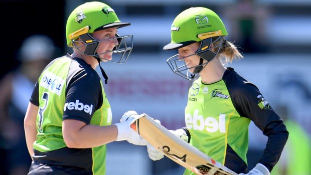 Aggressive: Haynes and Rachel Priest share a smile after another boundary.