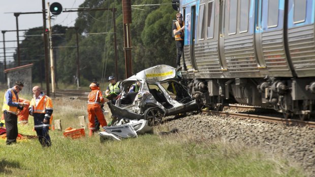 The wreckage of a car hit by a train. at Brunt Road, Officer.