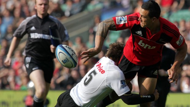 Overseas experience: Sonny Bill Williams offloads during the Crusaders' 'home' game against the Sharks in London in 2011. 
