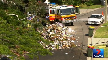 A garbage truck driver has dumped their load on a Bardon street after it caught fire.