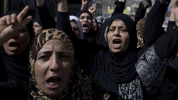 Palestinian women during the funeral procession on Saturday of Ehab Hanani, 19, who was fatally shot during clashes with Israeli troops in the West Bank village of Beit Furik last week.