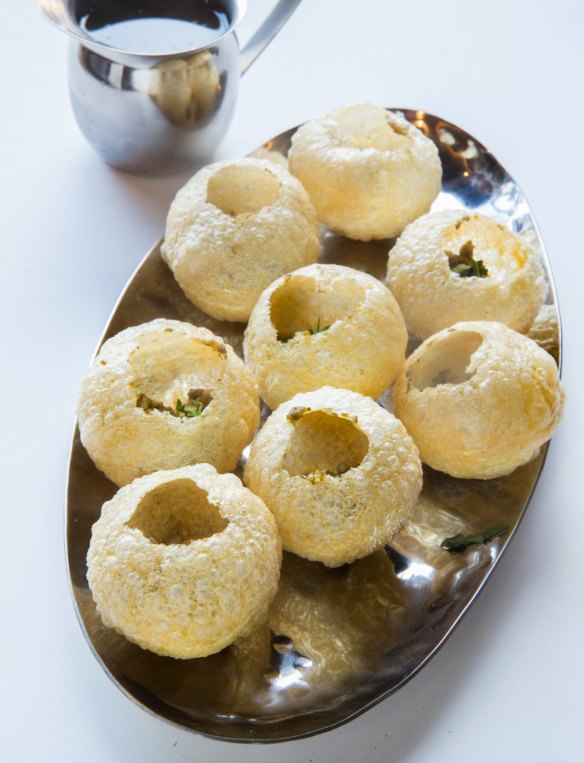 Pani puri puffs with pour-your-own tamarind dressng
