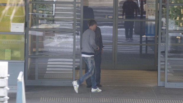 Showing support: Michael Clarke arrives at St Vincent's Hospital on Wednesday morning.