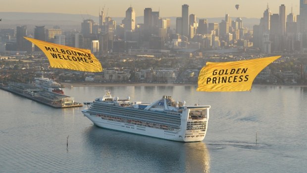 Banner-wielding helicopters welcome the Golden Princess to Melbourne.