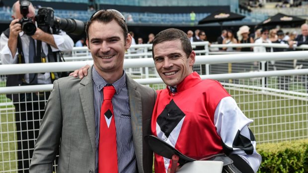 Golden day: Trainer Todd Willan with jockey Mitchell Bell following Artlee's win in the Country Championship last year. 