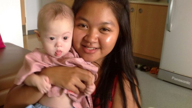 Thai surrogate mother Pattaramon Chanbua with baby Gammy, who has Down syndrome and was rejected by the prospective parents.