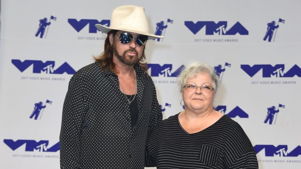 Billy Ray Cyrus and Susan Bro, mother of Heather Heyer, to the MTV Video Music Awards at The Forum on Sunday.