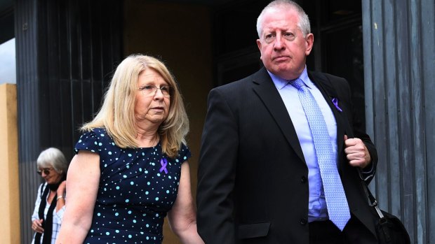Faye and Mark Leveson, walk hand in hand as they leave the last day of the Coronial Inquest into the death of their son Matthew Leveson on Tuesday. 