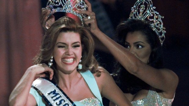 Alicia Machado is crowned Miss Universe.