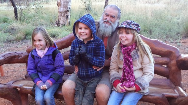 Emily, Sebastian and Jacqueline with Ned Thompson, guide at Desert Awakenings, on the bench graced by royal bottoms.