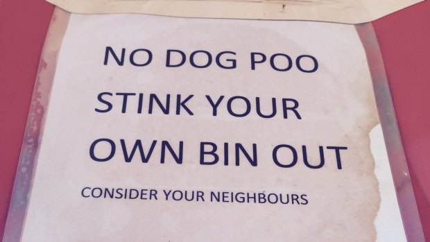 Dog walkers are on notice in Stanmore. The laminated sign shows how serious this person is about keeping doggie doo out of their bin.