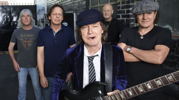 Quitting ... AC/DC's long-term bassist Cliff Williams, left, with Stevie Young, Angus Young, Chris Slade, and now retired Brian Johnson.
