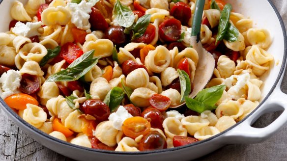 Summer pasta with cherry tomatoes, basil and pine nuts.