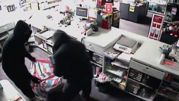 Police believe the same two men have carried out a series post office robberies worth more than $300,000. 