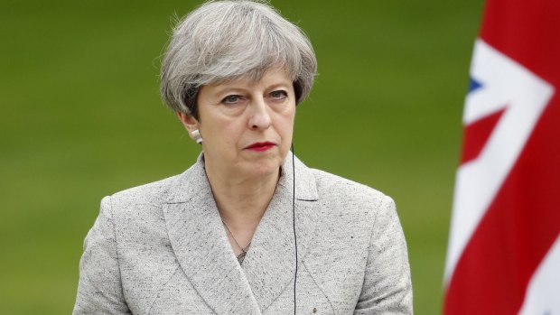 Saddened: British Prime Minister Theresa May.