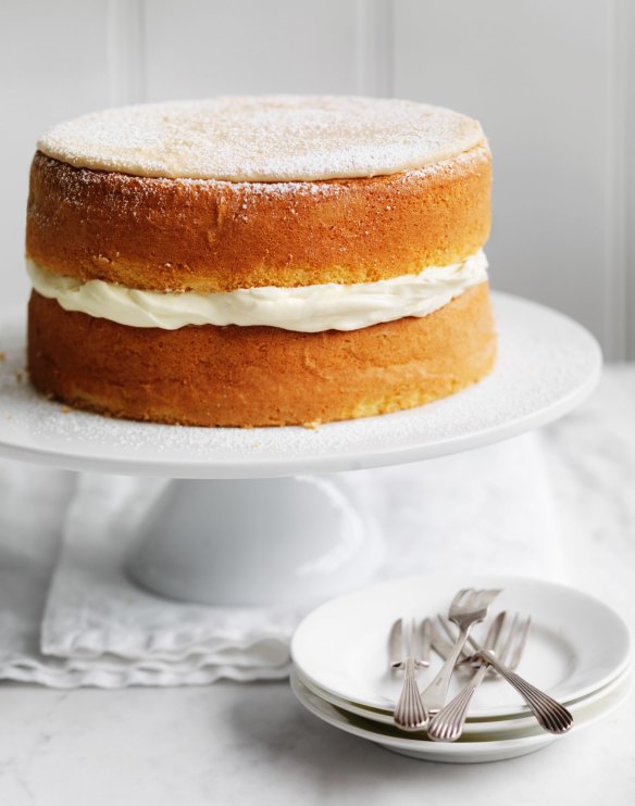 Simple sponge cake with coffee icing and whipped cream.