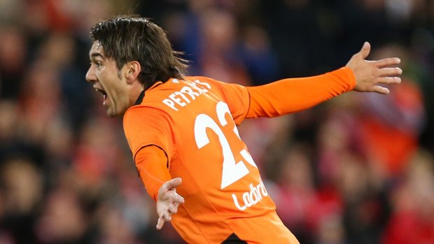 Dimitri Petratos of the Roar celebrates a goal during the international friendly match between against Liverpool FC at Suncorp Stadium.