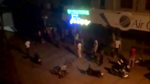 Suspected Islamic extremists opened fire at a Turkish restaurant in the capital of Burkina Faso late Sunday, killing at least 18 people in the second such attack on a restaurant popular with foreigners in the last two years. 