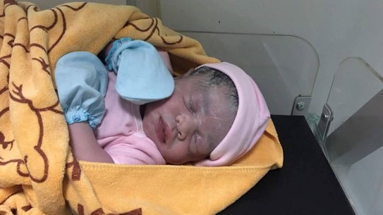 Cambodian Lux Clinic posted a photo of a minutes-old baby girl on Facebook following Hour Vanny's cesarean section on August 25. The surrogate mother confirmed the girl was the baby she carried.