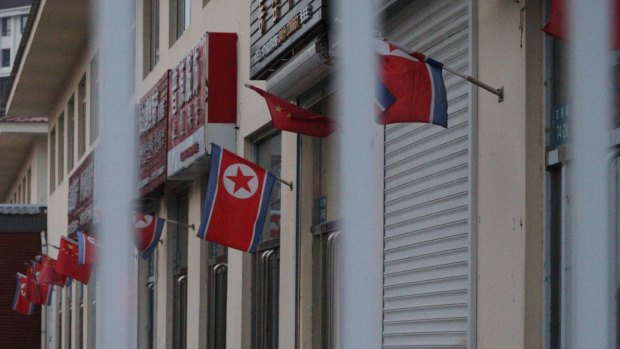 Shuttered North Korean shops at the frontier trade area in Dandong, China.
