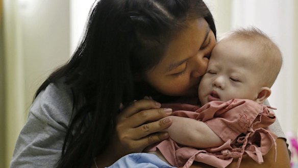 Surrogate mother Pattharamon Janbua with Gammy.