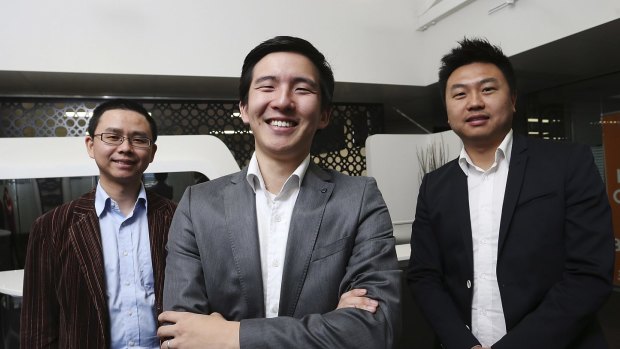 Bitcoin Group chief executive Sam Lee (centre), flanked by associates Jim Chen (left) and Allan Guo (right). 