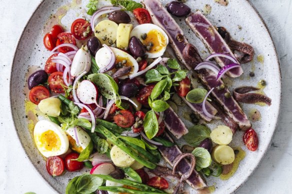 Never toss a nicoise - ingredients should be composed with an eye for colour and contrast.
