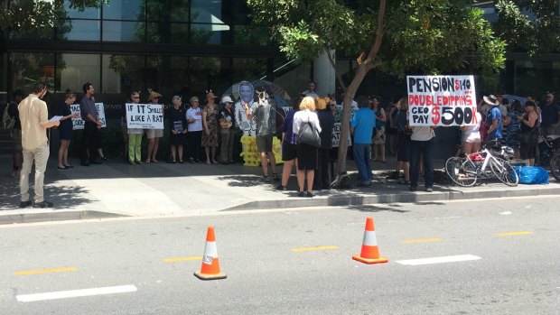 Protesters outside the Queensland Resources Council forum were concerned about Ian Macfarlane's new role.