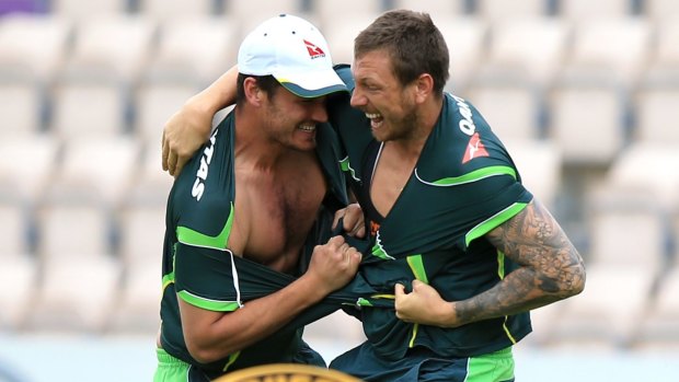 Australia fast-bowlers Nathan Coulter-Nile (left) and James Pattinson wrestle at the Ageas Bowl.