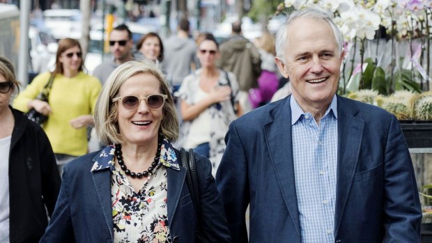 Power walkers: Lucy and Malcolm Turnbull stroll through Paddington last month.