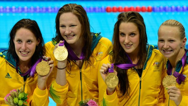 Alicia Coutts, Cate Campbell, Brittanie Elmslie and Melanie Schlanger bring home gold in the women's 4x100m freestyle relay at the London Olympics in 2012.