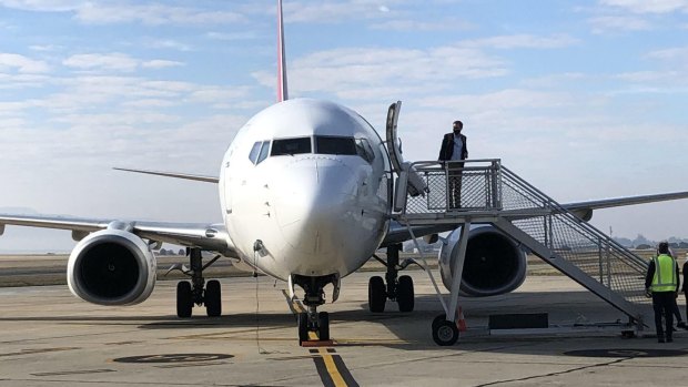 Unseasonably warm weather greeted passengers in Launceston on Qantas' mystery flight trip.