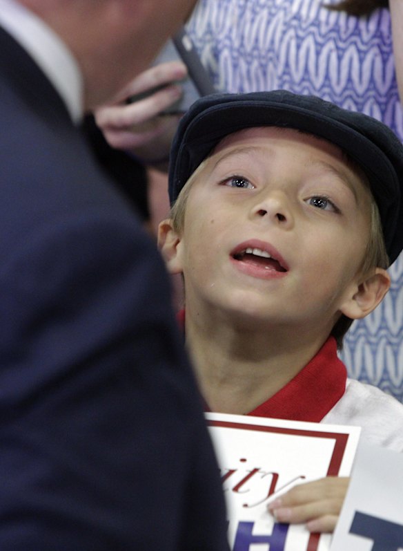 Working the crowd: a young boy looks up at Donald Trump during a campaign stop in Knoxville, Tennessee.