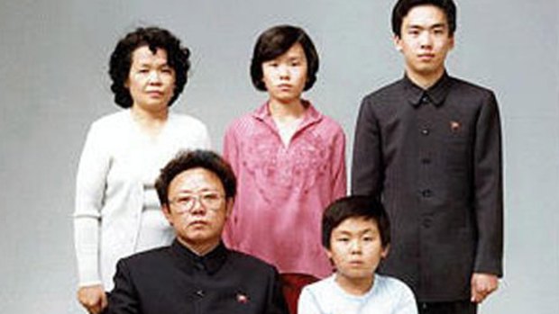 North Korean leader Kim Jong-il, seated, in 1981. First-born son Kim Jong-nam is bottom right.