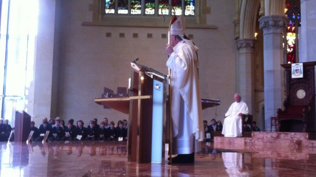 Archbishop of Perth Timothy Costello speaking with his congregation.