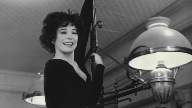 In her one dancing number as "Irma La Douce" Shirley MacLaine, slides down a balcony pole.