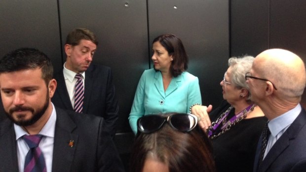 Queensland health minister Cameron Dick discussing health funding with premier Annastacia Palaszczuk in the lift at the Princess Alexandra Hospital.