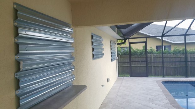 Ms Lehman put metal shutters on the window to protect her house in Florida from Hurricane Irma.